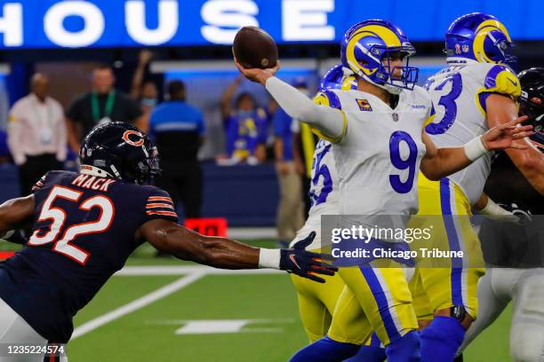 Chicago Bears outside linebacker Khalil Mack applies pressure to Los Angeles Rams quarterback Matthew Stafford , who threw a touchdown to Los Angeles...