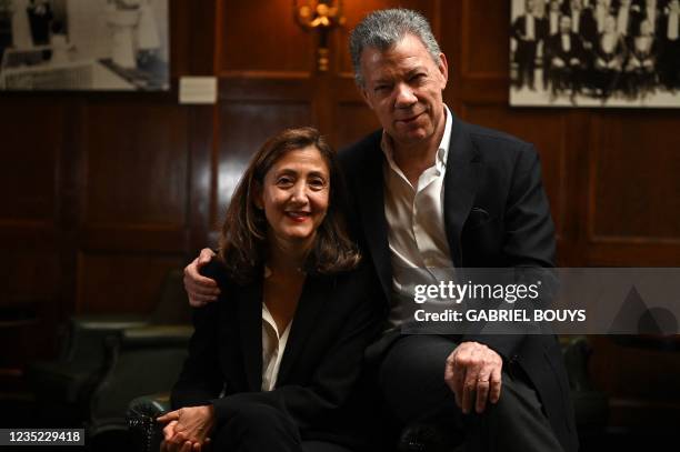 Former Colombian President Juan Manuel Santos and former presidential candidate, French-Colombian Ingrid Betancourt, who was kidnapped by the FARC...