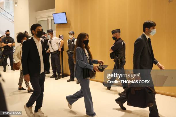 Georgios D. , and Chloe P. , who were allegedly roughed up by a former French presidential security aide during a May Day 2018 protest, arrive in...