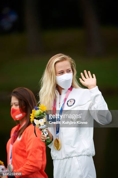 Summer Olympics: USA Nelly Korda victorious, wearing gold medal after Women's Final Round at Kasumigaseki CC. Korda wearing mask. Tokyo, Japan...