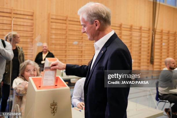 Norwegian Labor party leader Jonas Gahr Store casts his vote for the 2021 parliamentary election at the Svendstuen school in Oslo, Norway, on...