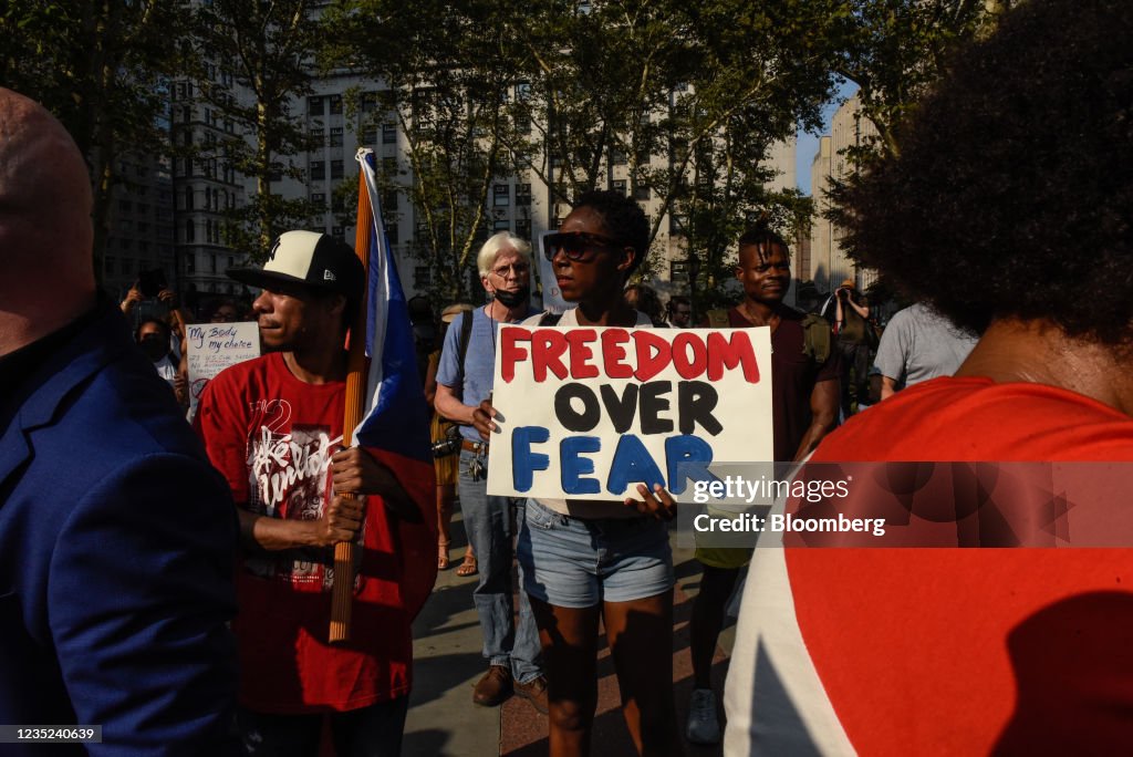 Walk Out Walk In Protest Demonstrators hold signs during a protest against Covid-19 mandates ...