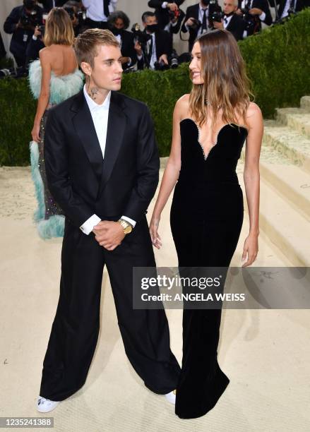 Canadian singer-songwriter Justin Bieber and his wife US model Hailey Rhode Baldwin Bieber arrive for the 2021 Met Gala at the Metropolitan Museum of...