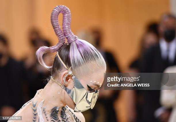 Canadian musician Grimes arrives for the 2021 Met Gala at the Metropolitan Museum of Art on September 13, 2021 in New York. - This year's Met Gala...