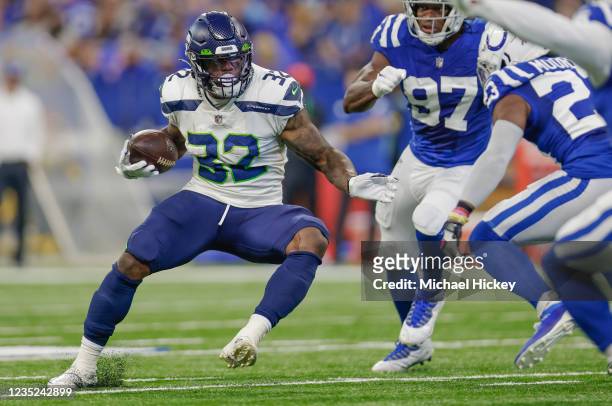 Chris Carson of the Seattle Seahawks runs the ball during the game against the Indianapolis Colts at Lucas Oil Stadium on September 12, 2021 in...
