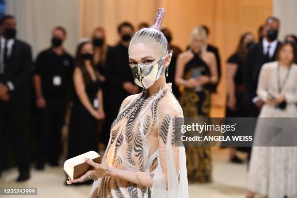 Canadian musician Grimes arrives for the 2021 Met Gala at the Metropolitan Museum of Art on September 13, 2021 in New York. - This year's Met Gala...