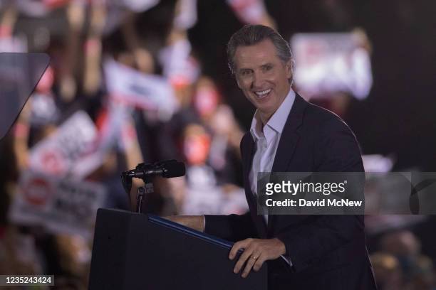 California Gov. Gavin Newsom speaks to the crowd before being joined by President Joe Biden to campaign to keep the governor in office at Long Beach...