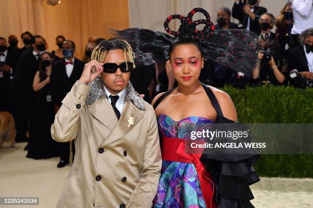 Japanese tennis player Naomi Osaka and US singer Cordae arrive for the 2021 Met Gala at the Metropolitan Museum of Art on September 13, 2021 in New...