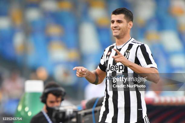 Juventus' forward Alvaro Morata celebrates after scoring the 0-1 goal during the Italian football Serie A match SSC Napoli vs Juventus FC on...