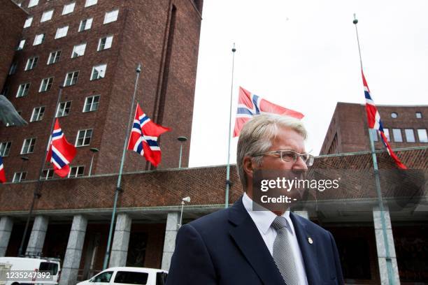 Olso mayor Fabian Stang stands outside the City Hall where flags have been put at half mast on July 23, 2011 in Olso. Norwegian Prime Minister Jens...