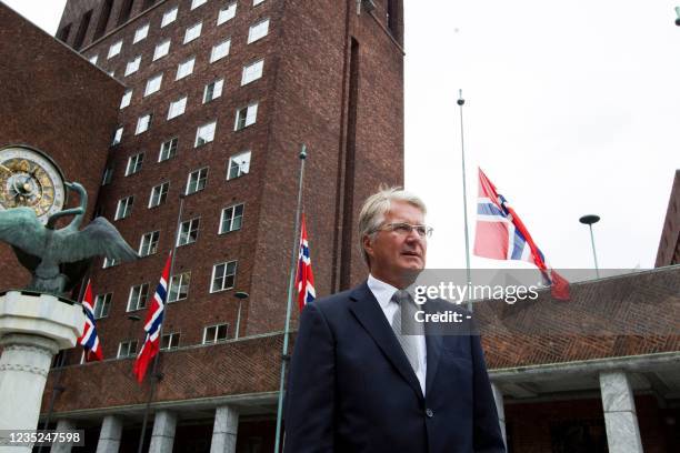 Olso mayor Fabian Stang stands outside the City Hall where flags have been put at half mast on July 23, 2011 in Olso. Norwegian Prime Minister Jens...