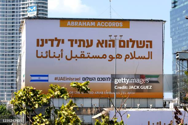 Billboard by the United Arab Emirates Embassy marking the signing of the US-brokered Abraham Accords are seen along the expressway in the Israeli...