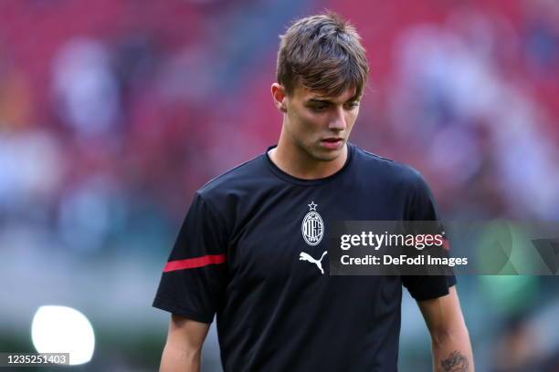 Daniel Maldini of AC Milan warm up prior to the Serie A match between AC Milan and SS Lazio at Stadio Giuseppe Meazza on September 12, 2021 in Milan,...