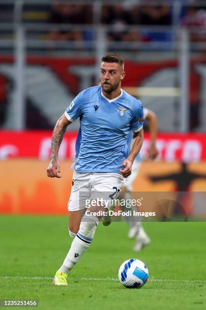 Sergej Milinkovic-Savic of SS Lazio controls the ball during the Serie A match between AC Milan and SS Lazio at Stadio Giuseppe Meazza on September...