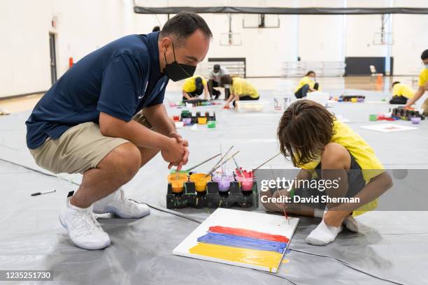 Minnesota Timberwolves President of Basketball Operations Gersson Rosas participates in a Hispanic-youth focused basketball clinic led by the...