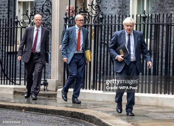 Britain's Chief Medical Officer for England Chris Whitty , Britain's Chief Scientific Adviser Patrick Vallance and Britain's Prime Minister Boris...