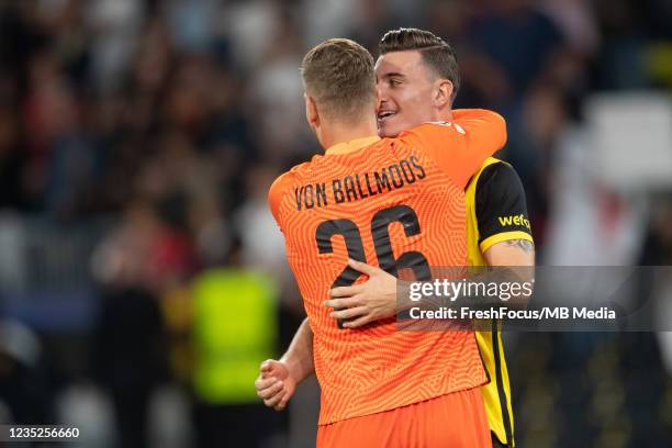 Cedric Zesiger of BSC Young Boys celebrates with David von Ballmoos the UEFA Champions League group F match between BSC Young Boys and Manchester...