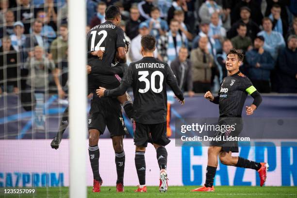 Alex Sandro of Juventus celebrates with teammates after scoring the 0-1 goal during the UEFA Champions League group H match between Malmo FF and...