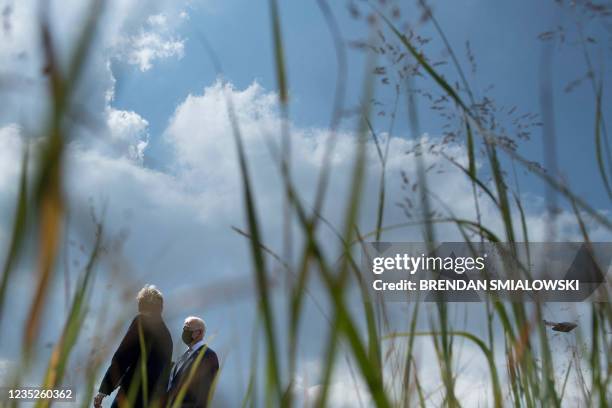 Secretary of Energy Jennifer Granholm walks with US President Joe Biden at the National Renewable Energy Laboratory September 14 in Arvada, Colorado.