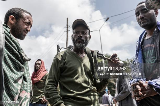 Amhara militiamen gather around in Dabat, 70 kilometres northeast of the city of Gondar, Ethiopia, on September 14, 2021.