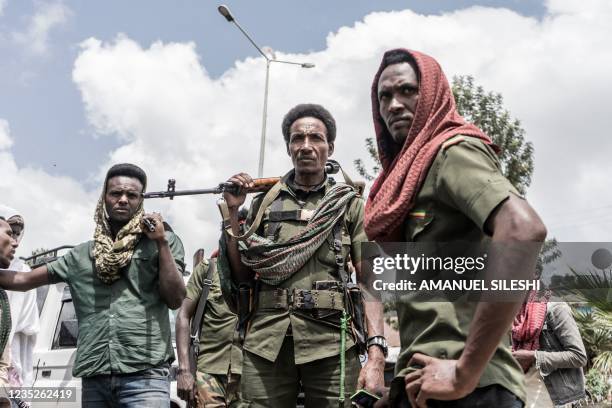 Amhara militiamen stand on guard in Dabat, 70 kilometres northeast of the city of Gondar, Ethiopia, on September 14, 2021.