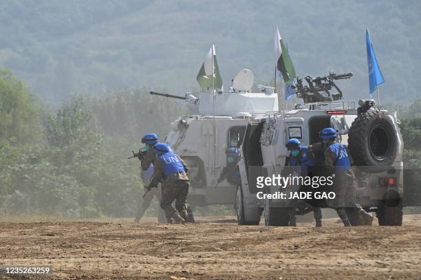 Pakistani soldiers take part in the multinational UN peacekeeping live exercise Shared Destiny-2021 held by Chinese military at a tactical training...