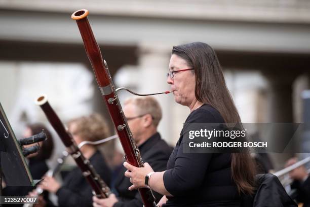 Member of the Cape Town Philharmonic Orchestra plays the bassoon as they give a lunch-time performance at Groote Schuur Hospital as a way of thanking...