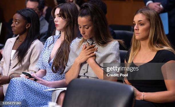 Gymnasts Simone Biles, McKayla Maroney, Aly Raisman and Maggie Nichols arrive to testify during a Senate Judiciary hearing about the Inspector...