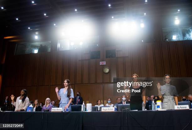 Gymnasts Simone Biles, McKayla Maroney, Maggie Nichols and Aly Raisman are sworn in to testify during a Senate Judiciary hearing about the Inspector...