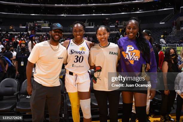 Chris Paul of the Phoenix Suns, Nneka Ogwumike and Chiney Ogwumike of the Los Angeles Sparks and former WNBA player, Tamera Young pose for a photo...