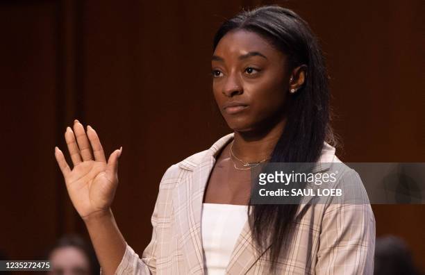 Olympic gymnasts Simone Biles is sworn in to testify during a Senate Judiciary hearing about the Inspector General's report on the FBI handling of...