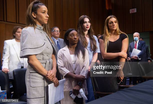 Olympic gymnasts Aly Raisman, Simone Biles, McKayla Maroney and NCAA and world champion gymnast Maggie Nichols leave after testifying during a Senate...