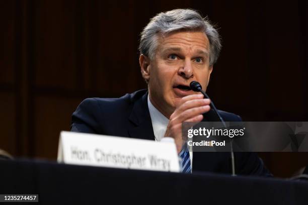 Director Christopher Wray testifies during a Senate Judiciary hearing about the Inspector General's report on the FBI's handling of the Larry Nassar...