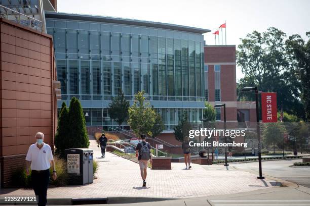 Students walk past the Tolley Student Center on campus at North Carolina State University in Raleigh, North Carolina, U.S., on Monday, Sept. 13,...