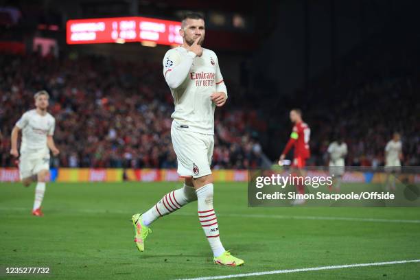 Ante Rebic of Milan celebrates his equalising goal during the UEFA Champions League group B match between Liverpool FC and AC Milan at Anfield on...