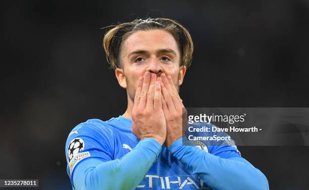 Manchester City's Jack Grealish celebrates scoring his side's fourth goal during the UEFA Champions League group A match between Manchester City and...