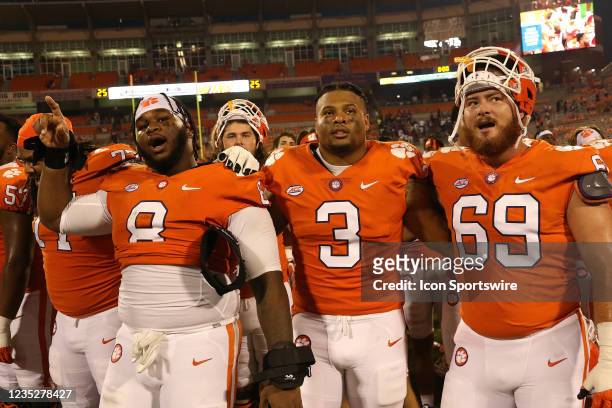 Tre Williams defensive tackle of Clemson Xavier Thomas defensive end of Clemson Jacob Edwards offensive lineman of Clemson during a college football...