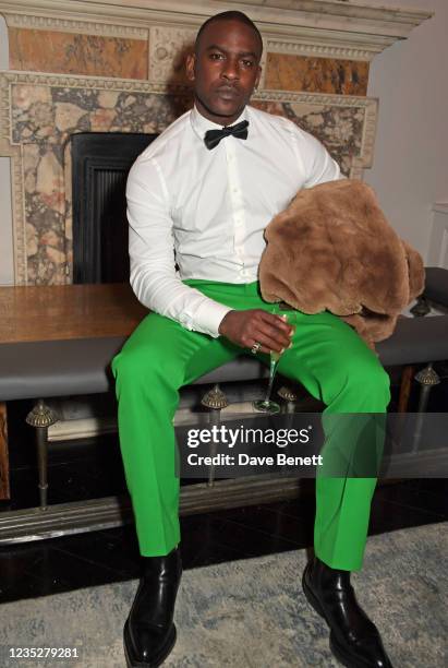 Skepta attends an intimate dinner to celebrate the launch of his bespoke blend rum "Rum Of Skepta" by Havana Club at the Dover St Arts Club on...