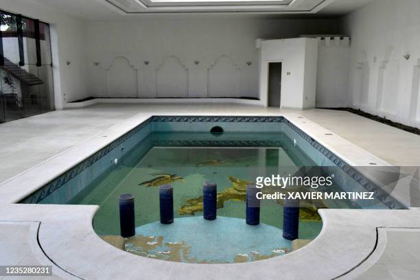View of the pool of a house that belonged to Mexican drug dealer Amado Carrillo Fuentes aka "El Senor de los Cielos" in Alvaro Obregon municipality,...