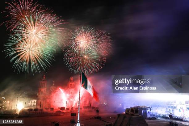 Fireworks explode over the Zocalo main square during the annual shout of independence as part of the independence day celebrations on September 15,...