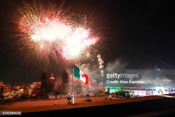 Fireworks explode over the Zocalo main square during the annual shout of independence as part of the independence day celebrations on September 15,...
