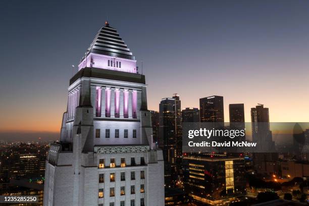 In an aerial view, the top of Los Angeles City Hall is seen while lit in the colors of the Mexican flag to mark 200 years of Central American...