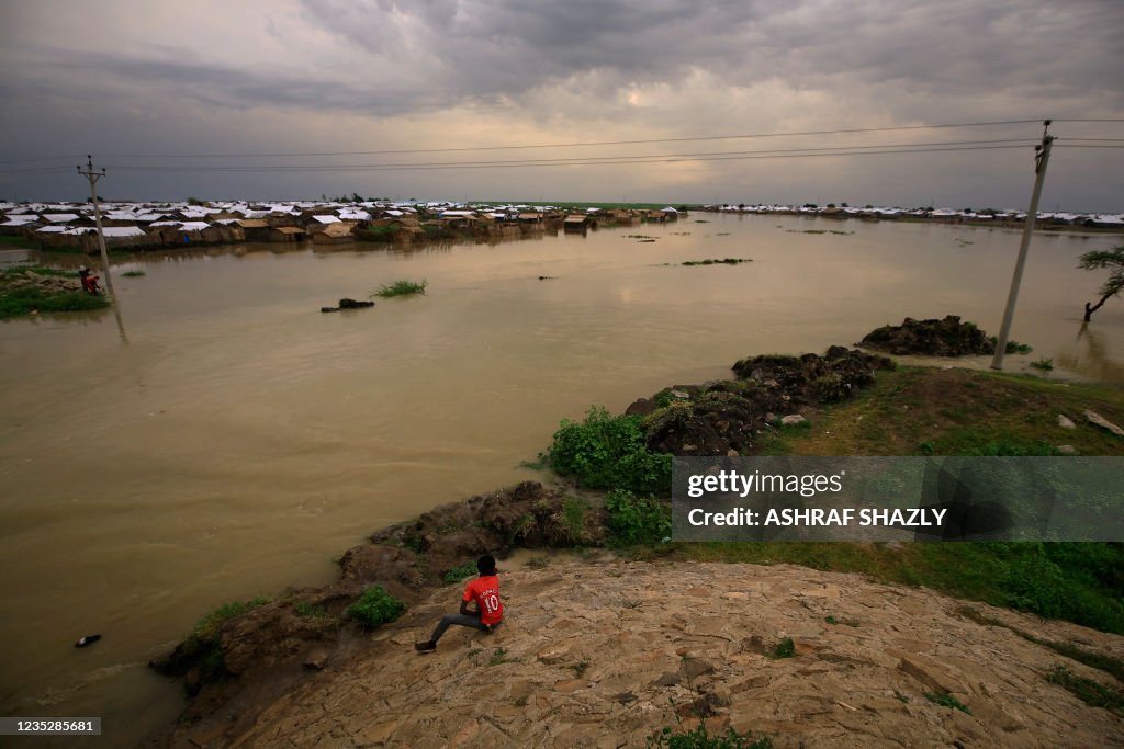 TOPSHOT-SUDAN-CONFLICT-REFUGEES-FLOODS