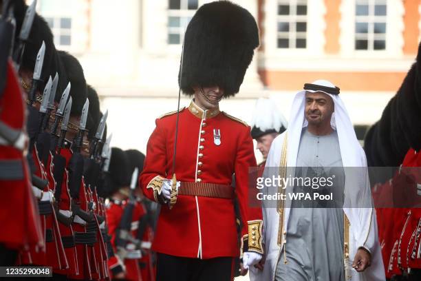 Sheikh Mohammed bin Zayed Al Nahyan, Crown Prince of Abu Dhabi inspects a Guard of Honour by the Grenadier Guards on September 16, 2021 in London,...