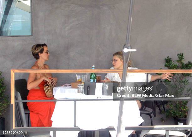 Arielle Kebbel and AJ Michalka are seen on September 15, 2021 in Los Angeles, California.