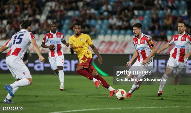 Galeno of Braga in action against Aleksandar Dragovic and Milos Degenek of Crvena Zvezda during the UEFA Europa League group F match between Crvena...