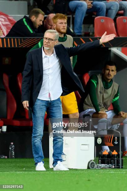 Head coach Peter Stoeger of Ferencvarosi TC gestures during the UEFA Europa League group G match between Bayer Leverkusen and Ferencvarosi TC at...