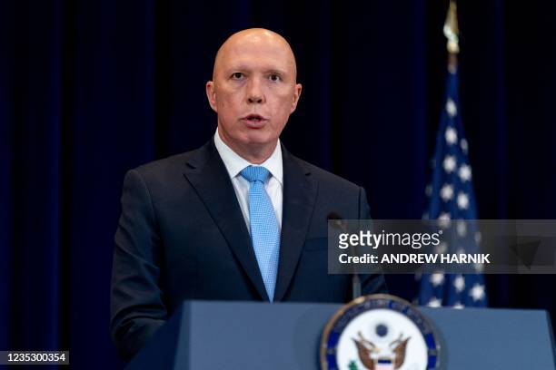 Australian Minister of Defense Peter Dutton speaks at a news conference with Australian Foreign Minister Marise Payne, US Secretary of State Antony...