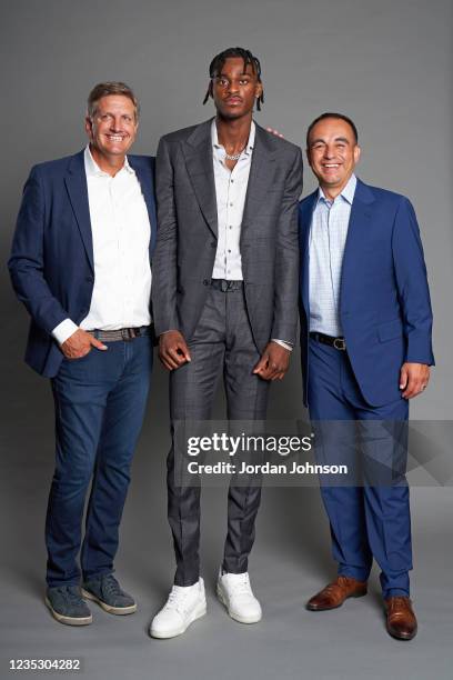 Head Coach Chris Finch of the Minnesota Timberwolves, president of basketball operations of the Minnesota Timberwolves, Gersson Rosas and Jarred...