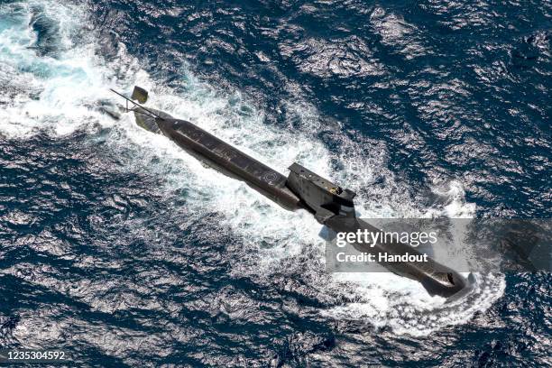 In this handout image provided by the Australian Defence Force, Royal Australian Navy submarine HMAS Rankin is seen during AUSINDEX 21, a biennial...